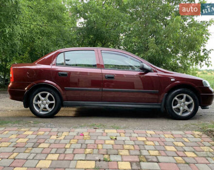 Красный Опель Астра, объемом двигателя 0 л и пробегом 88 тыс. км за 5000 $, фото 10 на Automoto.ua