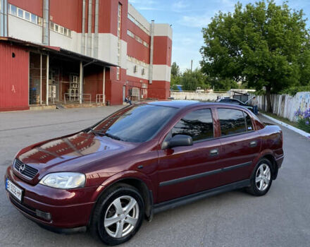 Красный Опель Астра, объемом двигателя 1.36 л и пробегом 173 тыс. км за 4800 $, фото 2 на Automoto.ua