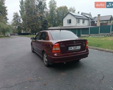 Красный Опель Астра, объемом двигателя 1.6 л и пробегом 234 тыс. км за 3800 $, фото 8 на Automoto.ua