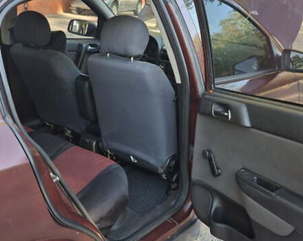 Красный Опель Астра, объемом двигателя 1.4 л и пробегом 229 тыс. км за 4900 $, фото 8 на Automoto.ua