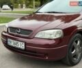 Червоний Опель Астра, об'ємом двигуна 1.6 л та пробігом 233 тис. км за 3400 $, фото 4 на Automoto.ua