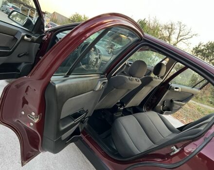 Опель Астра 2008 в Кобеляках на Automoto.ua Красный Опель Астра, объемом двигателя 1.4 л и пробегом 104 тыс. км за 4450 $, фото 4 на Automoto.ua