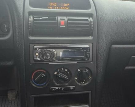 Красный Опель Астра, объемом двигателя 1.4 л и пробегом 233 тыс. км за 3800 $, фото 12 на Automoto.ua