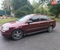 Красный Опель Астра, объемом двигателя 1.6 л и пробегом 234 тыс. км за 3800 $, фото 7 на Automoto.ua