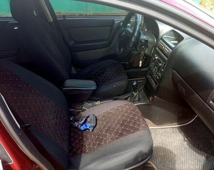 Червоний Опель Астра, об'ємом двигуна 1.4 л та пробігом 176 тис. км за 3700 $, фото 6 на Automoto.ua