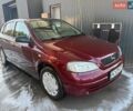 Красный Опель Астра, объемом двигателя 1.4 л и пробегом 172 тыс. км за 2800 $, фото 1 на Automoto.ua