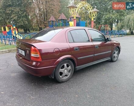 Красный Опель Астра, объемом двигателя 1.6 л и пробегом 234 тыс. км за 3800 $, фото 6 на Automoto.ua