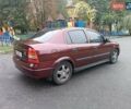 Красный Опель Астра, объемом двигателя 1.6 л и пробегом 234 тыс. км за 3800 $, фото 6 на Automoto.ua