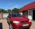 Красный Опель Астра, объемом двигателя 1.38 л и пробегом 206 тыс. км за 2900 $, фото 1 на Automoto.ua
