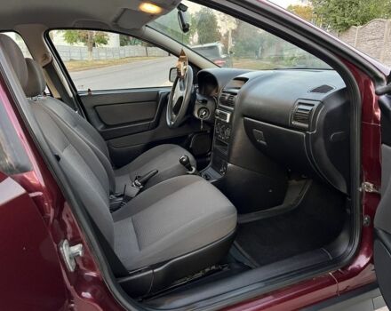 Опель Астра 2008 в Кобеляках на Automoto.ua Красный Опель Астра, объемом двигателя 1.4 л и пробегом 104 тыс. км за 4450 $, фото 12 на Automoto.ua