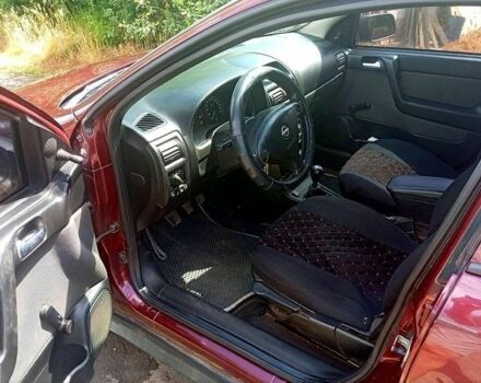 Червоний Опель Астра, об'ємом двигуна 1.4 л та пробігом 176 тис. км за 3700 $, фото 5 на Automoto.ua