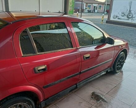 Красный Опель Астра, объемом двигателя 1.6 л и пробегом 190 тыс. км за 3700 $, фото 4 на Automoto.ua