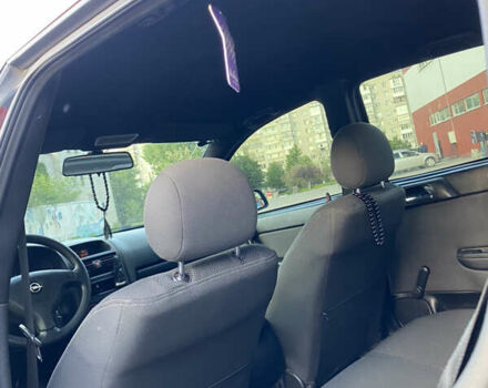 Красный Опель Астра, объемом двигателя 1.36 л и пробегом 173 тыс. км за 4800 $, фото 9 на Automoto.ua