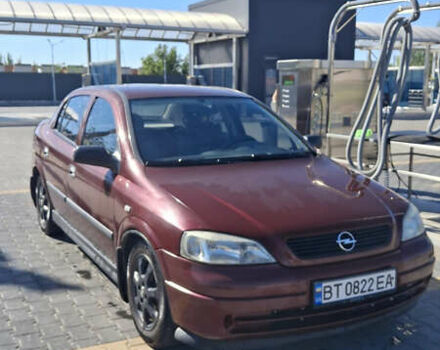 Красный Опель Астра, объемом двигателя 1.4 л и пробегом 229 тыс. км за 4900 $, фото 3 на Automoto.ua