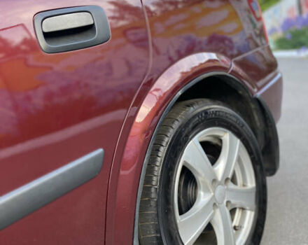 Красный Опель Астра, объемом двигателя 1.36 л и пробегом 173 тыс. км за 4800 $, фото 12 на Automoto.ua