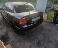Червоний Опель Астра, об'ємом двигуна 1.6 л та пробігом 120 тис. км за 2700 $, фото 1 на Automoto.ua