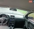 Красный Опель Астра, объемом двигателя 1.6 л и пробегом 234 тыс. км за 3800 $, фото 1 на Automoto.ua