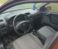 Красный Опель Астра, объемом двигателя 1.6 л и пробегом 234 тыс. км за 3800 $, фото 2 на Automoto.ua