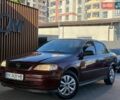 Червоний Опель Астра, об'ємом двигуна 1.4 л та пробігом 193 тис. км за 2999 $, фото 1 на Automoto.ua
