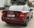 Червоний Опель Астра, об'ємом двигуна 1.6 л та пробігом 233 тис. км за 3400 $, фото 19 на Automoto.ua