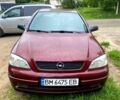 Красный Опель Астра, объемом двигателя 1.4 л и пробегом 102 тыс. км за 3450 $, фото 1 на Automoto.ua