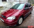 Красный Опель Астра, объемом двигателя 1.4 л и пробегом 171 тыс. км за 4150 $, фото 1 на Automoto.ua