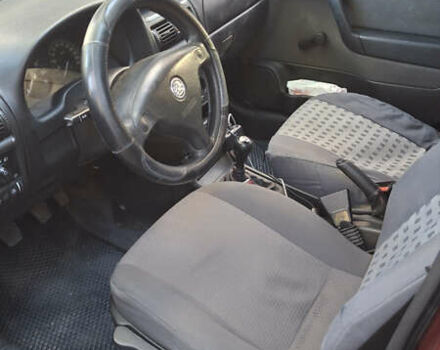 Красный Опель Астра, объемом двигателя 1.4 л и пробегом 229 тыс. км за 4900 $, фото 4 на Automoto.ua