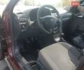 Красный Опель Астра, объемом двигателя 1.4 л и пробегом 320 тыс. км за 3450 $, фото 3 на Automoto.ua