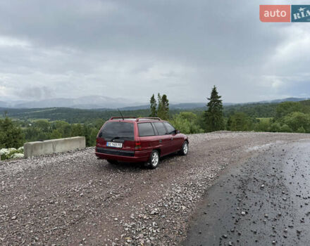 Красный Опель Астра, объемом двигателя 1.7 л и пробегом 413 тыс. км за 2450 $, фото 1 на Automoto.ua