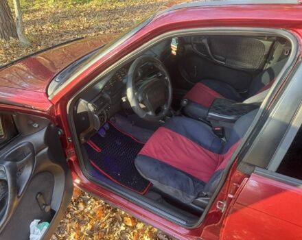 Красный Опель Астра, объемом двигателя 1.7 л и пробегом 413 тыс. км за 2450 $, фото 6 на Automoto.ua