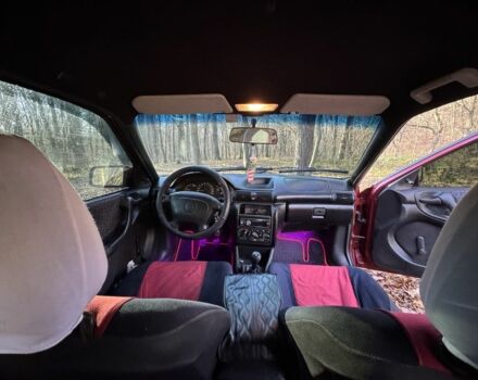 Красный Опель Астра, объемом двигателя 1.7 л и пробегом 413 тыс. км за 2450 $, фото 12 на Automoto.ua