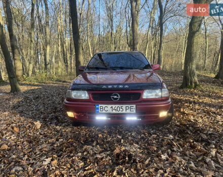 Красный Опель Астра, объемом двигателя 1.7 л и пробегом 413 тыс. км за 2450 $, фото 3 на Automoto.ua