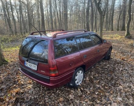 Красный Опель Астра, объемом двигателя 1.7 л и пробегом 413 тыс. км за 2450 $, фото 4 на Automoto.ua