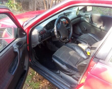 Красный Опель Астра, объемом двигателя 1.6 л и пробегом 300 тыс. км за 1000 $, фото 4 на Automoto.ua