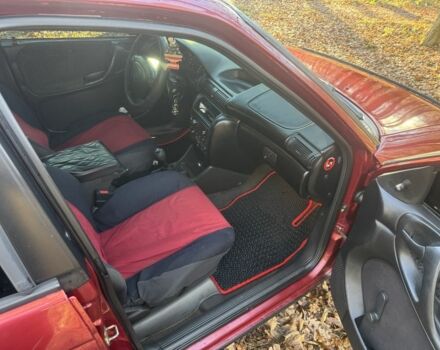 Красный Опель Астра, объемом двигателя 1.7 л и пробегом 413 тыс. км за 2450 $, фото 11 на Automoto.ua