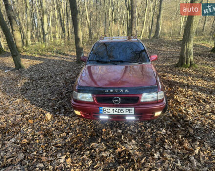 Красный Опель Астра, объемом двигателя 1.7 л и пробегом 413 тыс. км за 2450 $, фото 2 на Automoto.ua