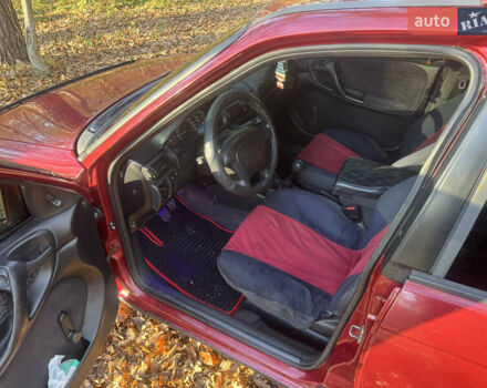 Красный Опель Астра, объемом двигателя 1.7 л и пробегом 413 тыс. км за 2450 $, фото 15 на Automoto.ua