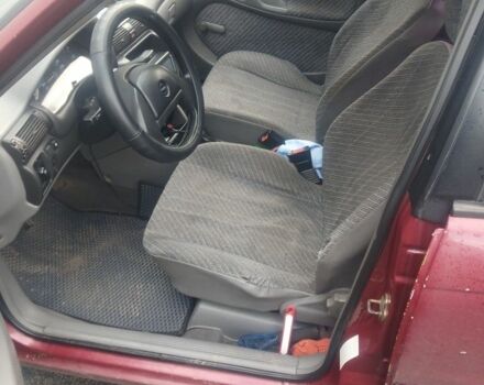 Красный Опель Астра, объемом двигателя 1.6 л и пробегом 307 тыс. км за 1800 $, фото 4 на Automoto.ua