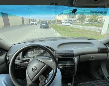 Червоний Опель Астра, об'ємом двигуна 1.6 л та пробігом 373 тис. км за 600 $, фото 1 на Automoto.ua