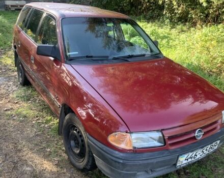 Красный Опель Астра, объемом двигателя 1.4 л и пробегом 200 тыс. км за 1160 $, фото 2 на Automoto.ua