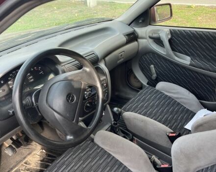 Червоний Опель Астра, об'ємом двигуна 1.6 л та пробігом 373 тис. км за 600 $, фото 2 на Automoto.ua