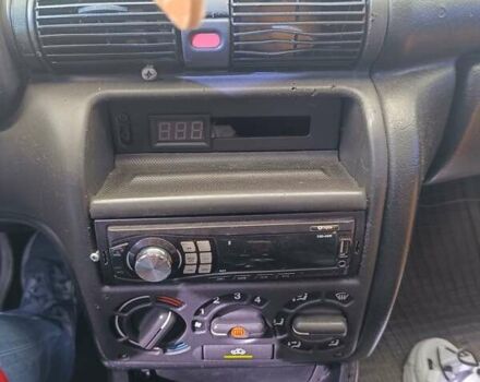 Червоний Опель Астра, об'ємом двигуна 1.6 л та пробігом 333 тис. км за 1400 $, фото 11 на Automoto.ua