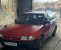 Красный Опель Астра, объемом двигателя 1.4 л и пробегом 294 тыс. км за 1500 $, фото 1 на Automoto.ua