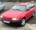 Красный Опель Астра, объемом двигателя 1.4 л и пробегом 294 тыс. км за 1250 $, фото 1 на Automoto.ua