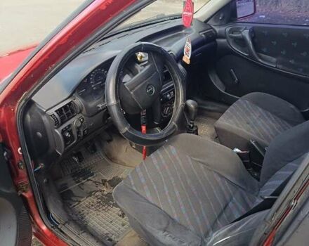 Червоний Опель Астра, об'ємом двигуна 1.6 л та пробігом 330 тис. км за 1300 $, фото 3 на Automoto.ua