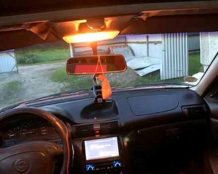 Красный Опель Астра, объемом двигателя 1.6 л и пробегом 440 тыс. км за 1500 $, фото 8 на Automoto.ua