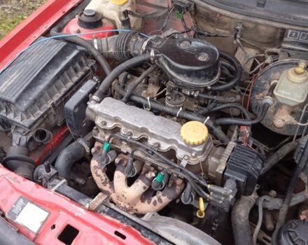 Красный Опель Астра, объемом двигателя 1.6 л и пробегом 310 тыс. км за 1250 $, фото 2 на Automoto.ua