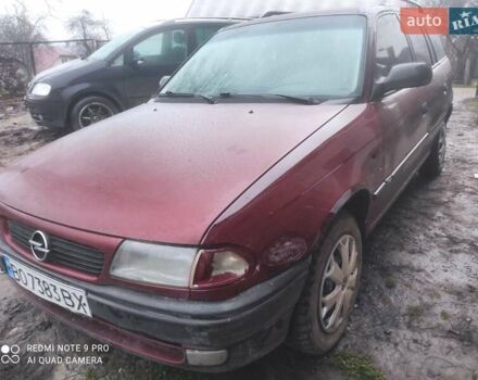 Красный Опель Астра, объемом двигателя 1.6 л и пробегом 320 тыс. км за 1200 $, фото 1 на Automoto.ua