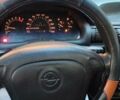 Красный Опель Астра, объемом двигателя 1.6 л и пробегом 290 тыс. км за 1850 $, фото 6 на Automoto.ua