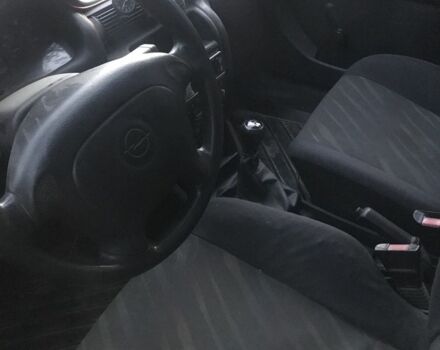 Красный Опель Астра, объемом двигателя 1.6 л и пробегом 30 тыс. км за 1800 $, фото 3 на Automoto.ua